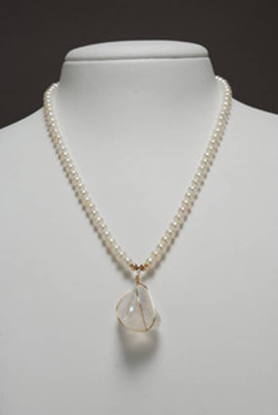 White Freshwater Pearls Necklace  with  Angel Aura Crystal Quartz pendant.