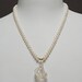 White Freshwater Pearls Necklace  with  Angel Aura Crystal Quartz pendant.