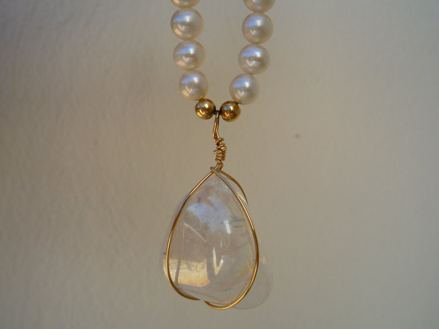 White Freshwater Pearls Necklace  with  Angel Aura Crystal Quartz pendant.