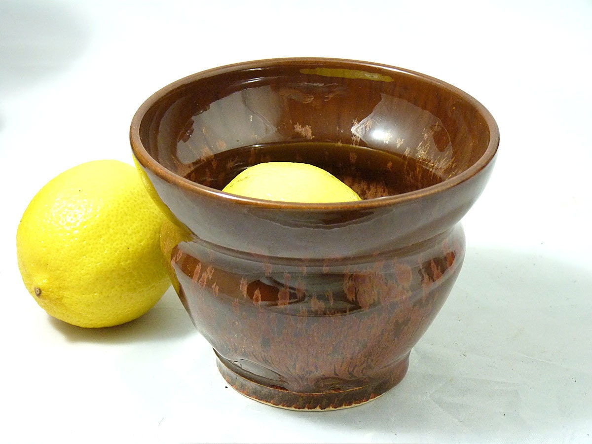 Small Bowl with unique shape in beautiful deep red glaze