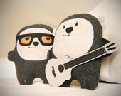 Bambak, sunglassed stuffed guy