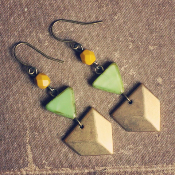 nielle.  a pair of green and mustard geometric chevron earrings.