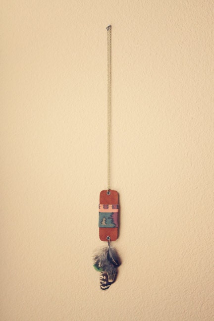 fionna. a suede and feather ikat necklace.