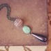 dali.  an earthy beaded teardrop necklace.