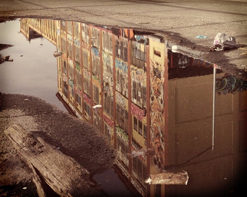 5 Pointz graffiti mecca reflected in rain puddle. Queens, New York