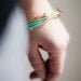 Mint Green Leather Bracelet with Golden or Silver Small Hearts and Tubes by pardes israel