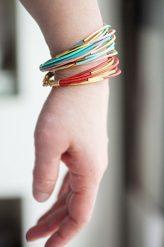 Pastel colors Leather Bracelet with 12 Golden tubes by pardes israel