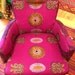Mid century club chairs reupholstered in purple african wax print fabrics