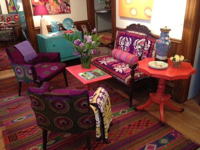 Mid century club chairs reupholstered in purple african wax print fabrics
