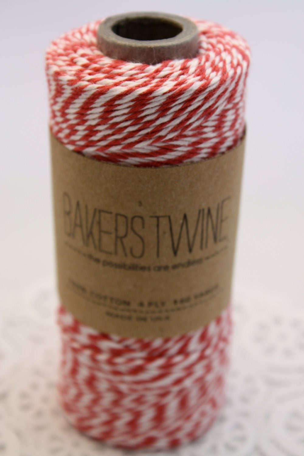 160 yards Red and White Bakers Twine wound on a spool