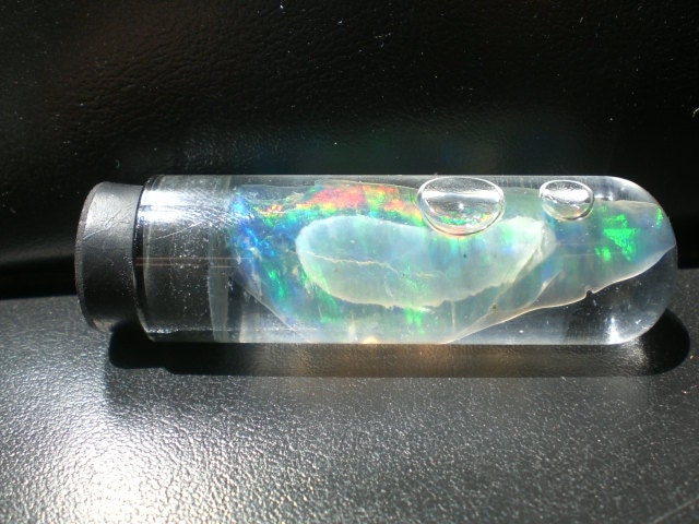 Amazing Virgin Valley Opal with a phantom. Very rare, unique and beautiful.
