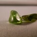 Two Peridot polished stones. 11.5 carats.