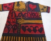 I LOVE YOU, heart, hands XOXO discharge t-shirt with a original heart design in reds and deep yellow