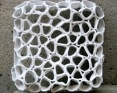 Contemporary ceramic decorative wall tile from "Particle" series