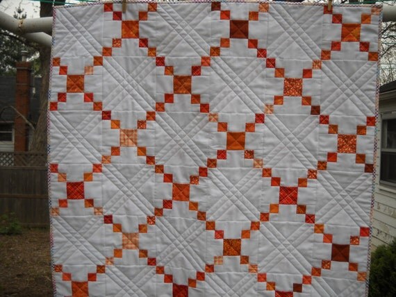 Orange and White Irish Chain Baby Quilt by RedRabbitQuilting
