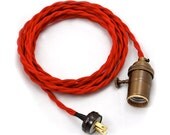 Red plug-in swag light, cloth covered pendant