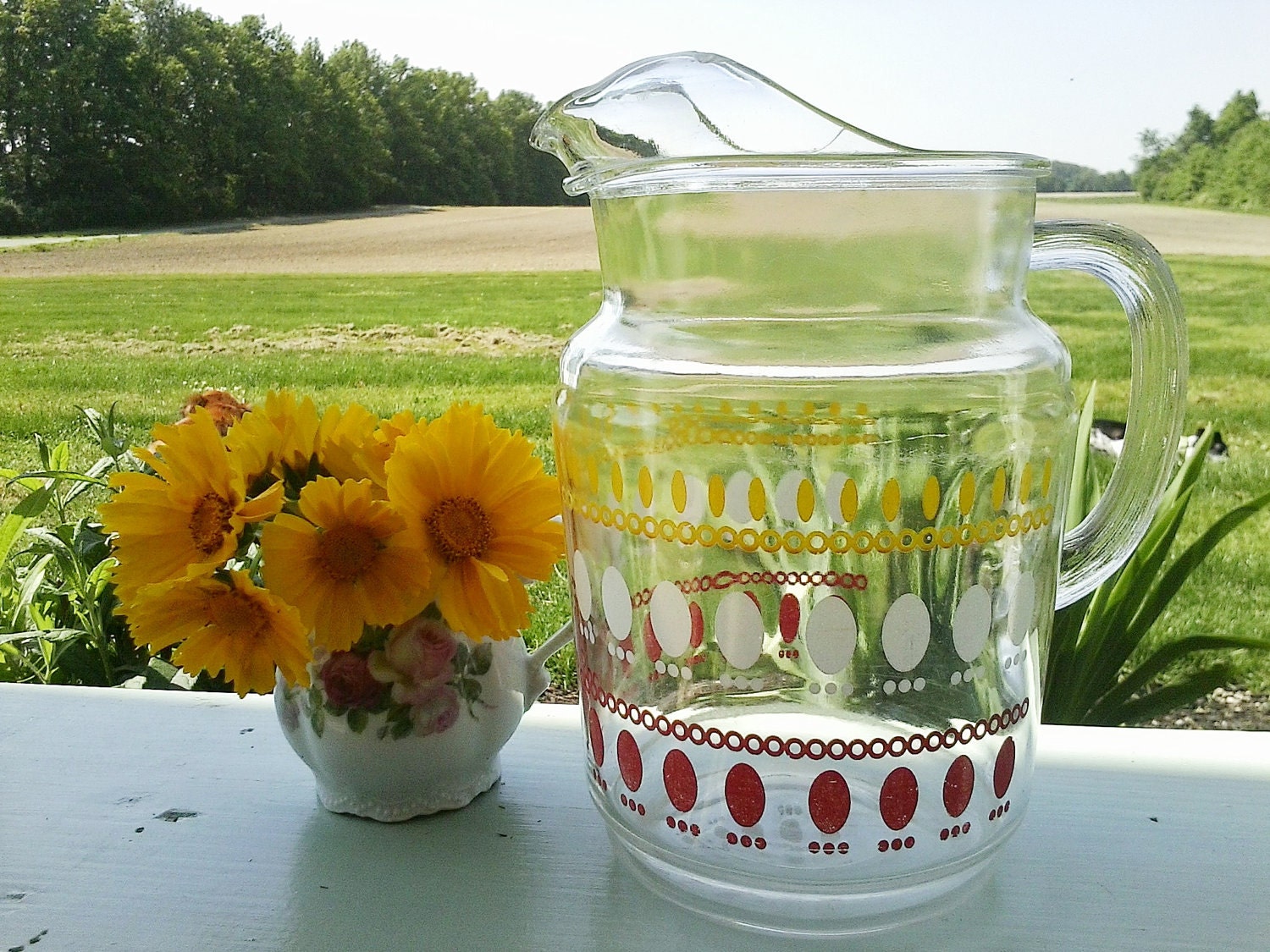 Vintage mid-century yellow, white and red heavy glass water pitcher