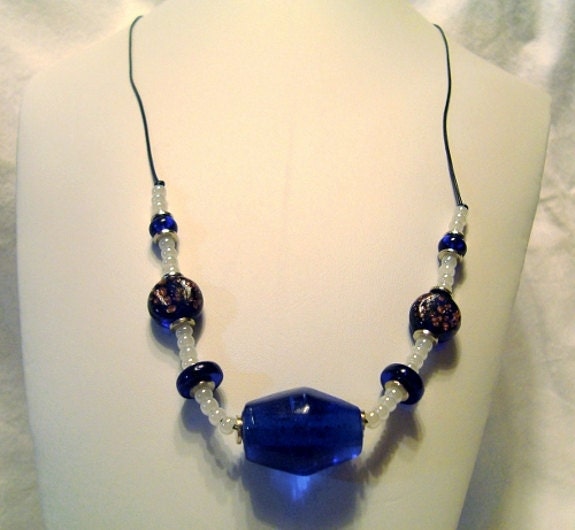 Lampwork Necklace Blue and Pealized beads on leather. N048