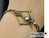 Antique Brass Bow with peeta Pearl bracelet