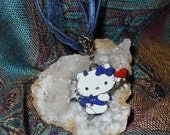 Hello Kitty Devil in a Blue Dress Necklace