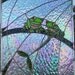 Stained Glass Frogs on A Branch.