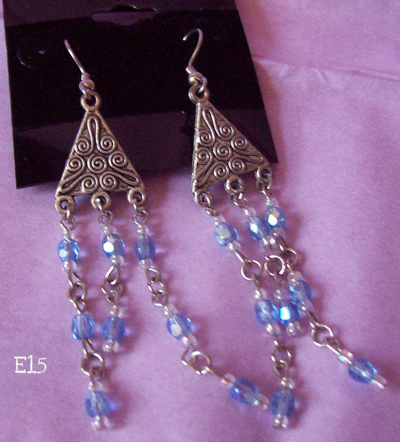 E15- Silver triangle chandelier earrings with blue beads