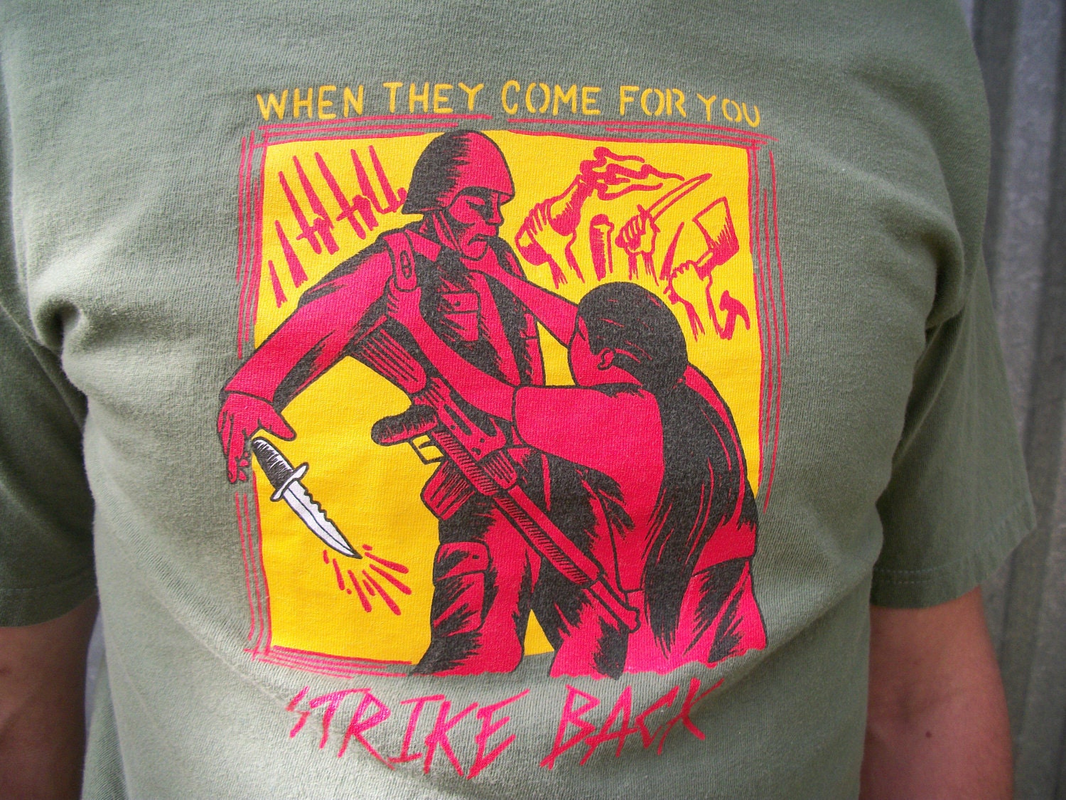 Men's shirt, t shirt, propaganda, anti communist, anti war, revolution, anti army, anti military. Sage green,yellow, red, size small
