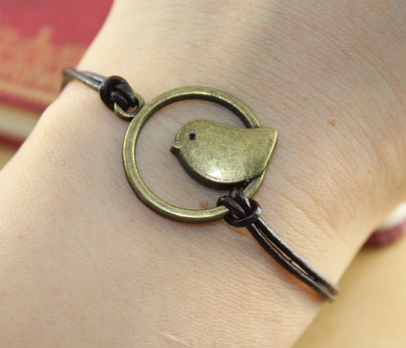 Bracelet---Birdcage pendant ,brown leather bracelet