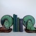 reserved for vivienne - vintage industrial green castor set/bookends