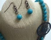 Turquoise and Verdigris Copper Mockingjay and Flower Asymmetrical  Necklace and Earring Set