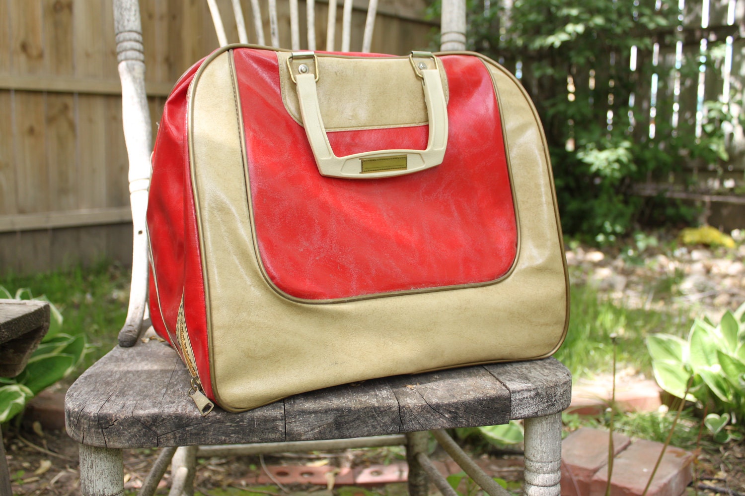 Vintage, retro red and cream carry on bag, camera bag, make up bag, bolwing bag