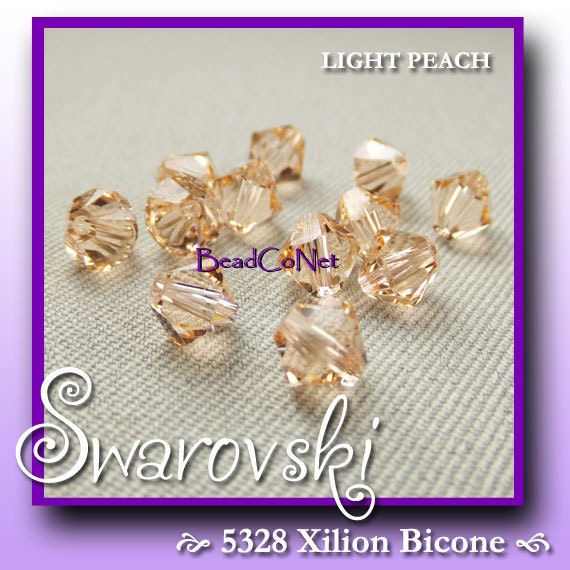12 LIGHT PEACH Crystalized Austrian SWAROVSKI Crystals 5328 Xilion Faceted Bicone 6mm, Jewelry Supplies - beadconet 1068