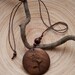 Wooden pendant necklace with flower