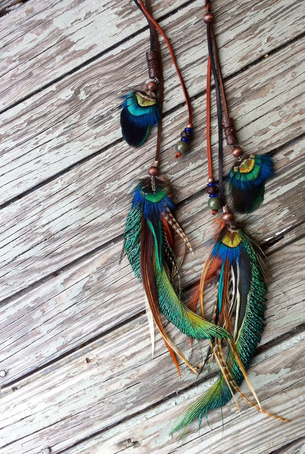 Wanna see my peacock feather and braided leather headband, belt, or lariat
