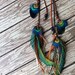 Wanna see my peacock feather and braided leather headband, belt, or lariat