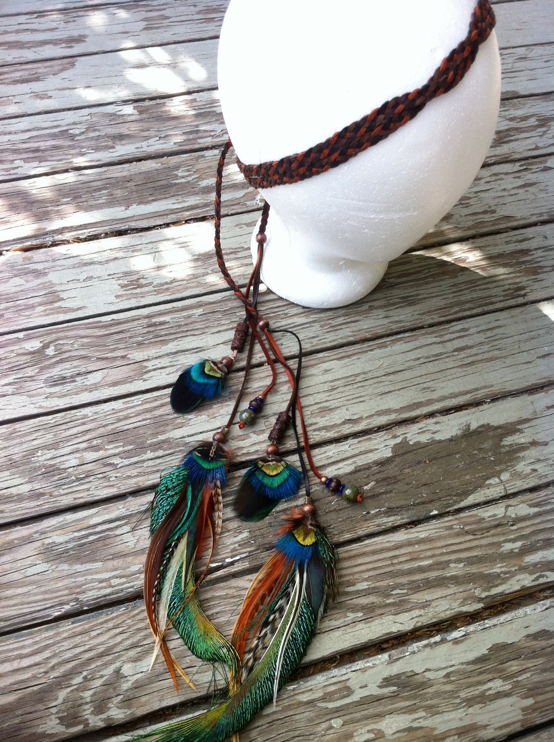 Wanna see my peacock feather and braided leather headband, belt, or lariat