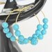 Turquoise Rhinestone Hoop Earings.