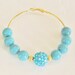 Turquoise Rhinestone Hoop Earings.