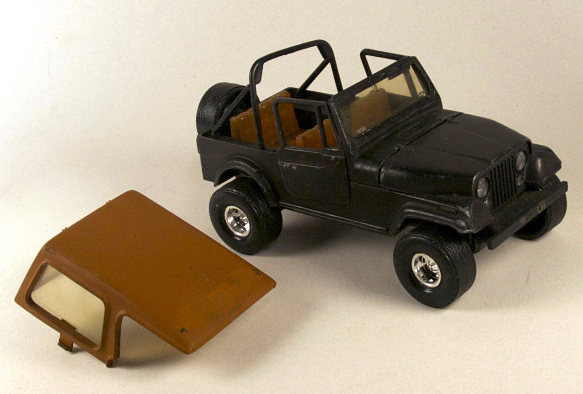 Vintage Black JEEP CJ, metal, by ERTL, rare 1980s