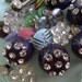 Lots of Shine from a Lot of Shiny Buttons, all size and shapes. Stunning.