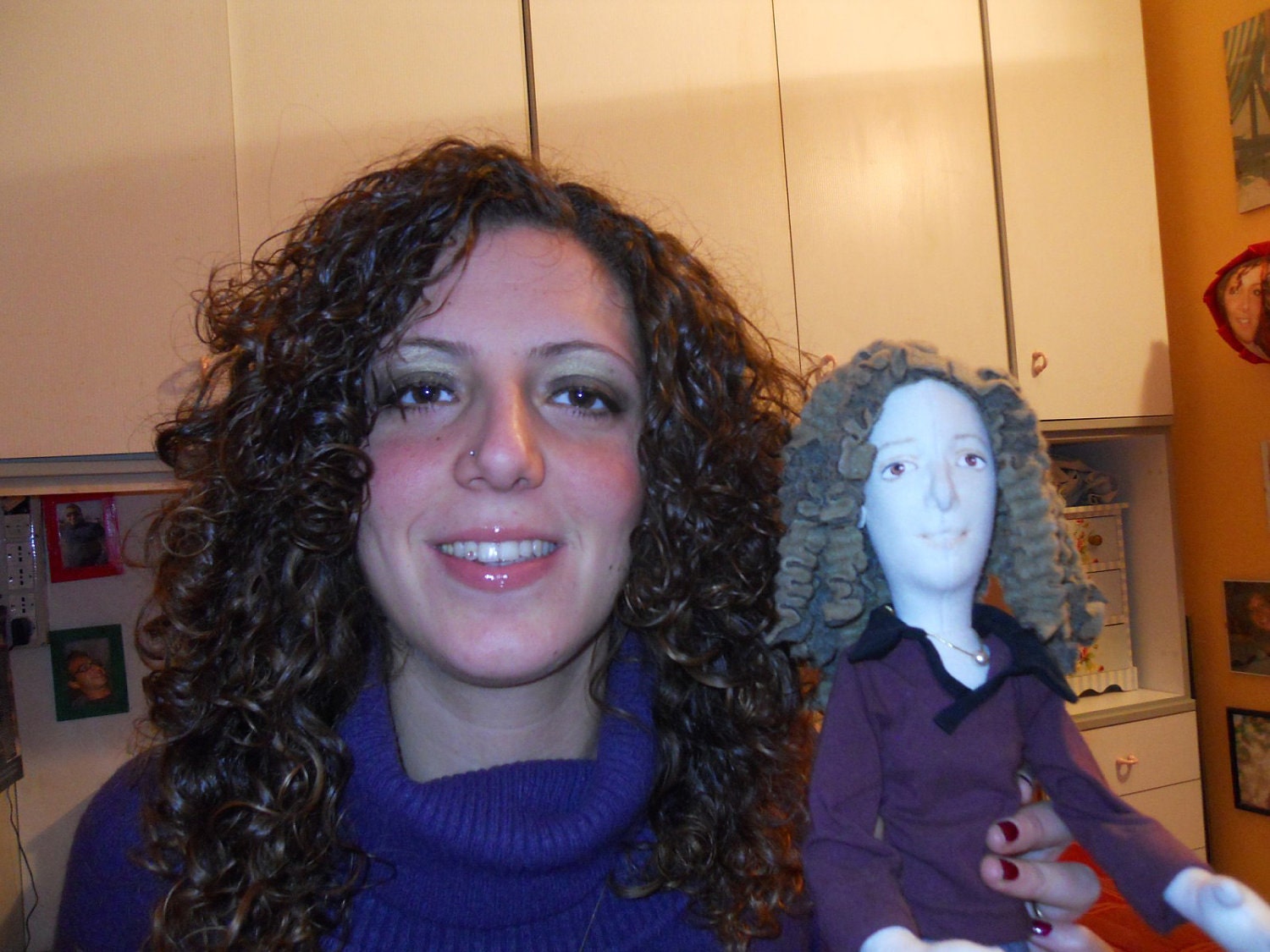 A couple of portrait dolls in cloth.