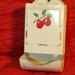 Antique Metal Match holder with Red Apples