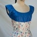 20% Off Was 60.00 Now 48.00 Darling 50's Flower Patterned Garden Dress with Full Twirl Skirt Size-M