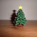Christmas tree with multi-colored rhinestones.