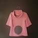 Baby Girl Cowl Dress in vintage pink knit cotton with circle pocket and patch in charcoal grey and white stripes - 6-9 months