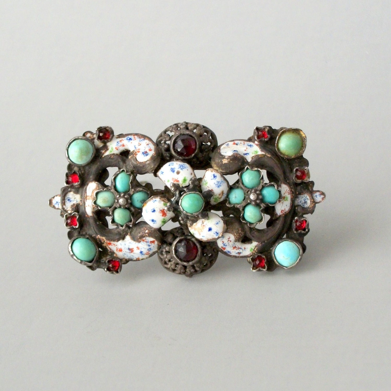 Austro Hungarian Brooch . Garnets Turquoise . Confetti Enamel .