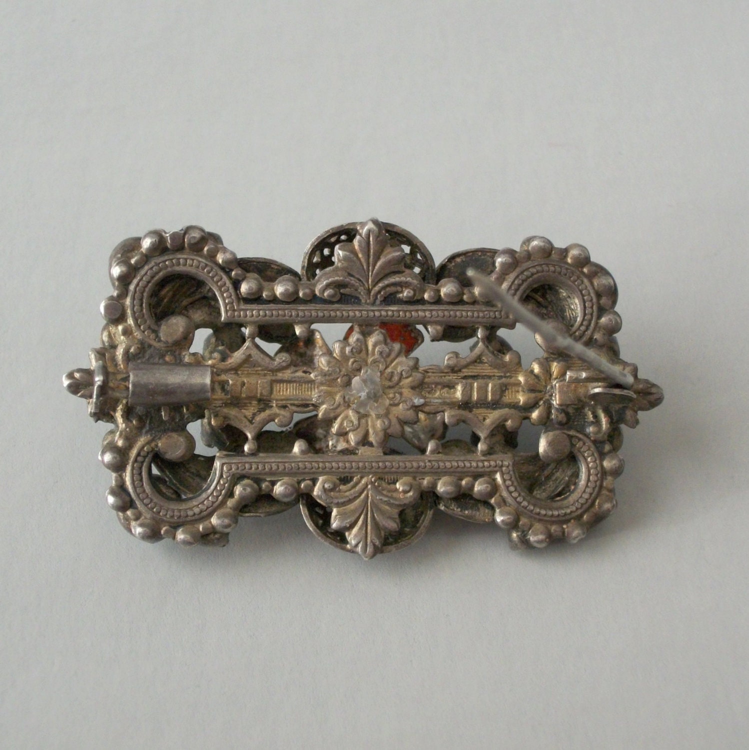 Austro Hungarian Brooch . Garnets Turquoise . Confetti Enamel .