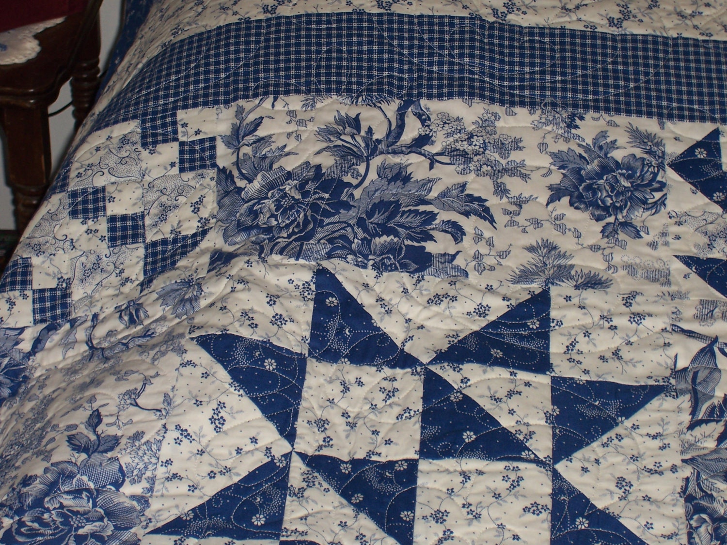 Blue and White Floral Print Quilt
