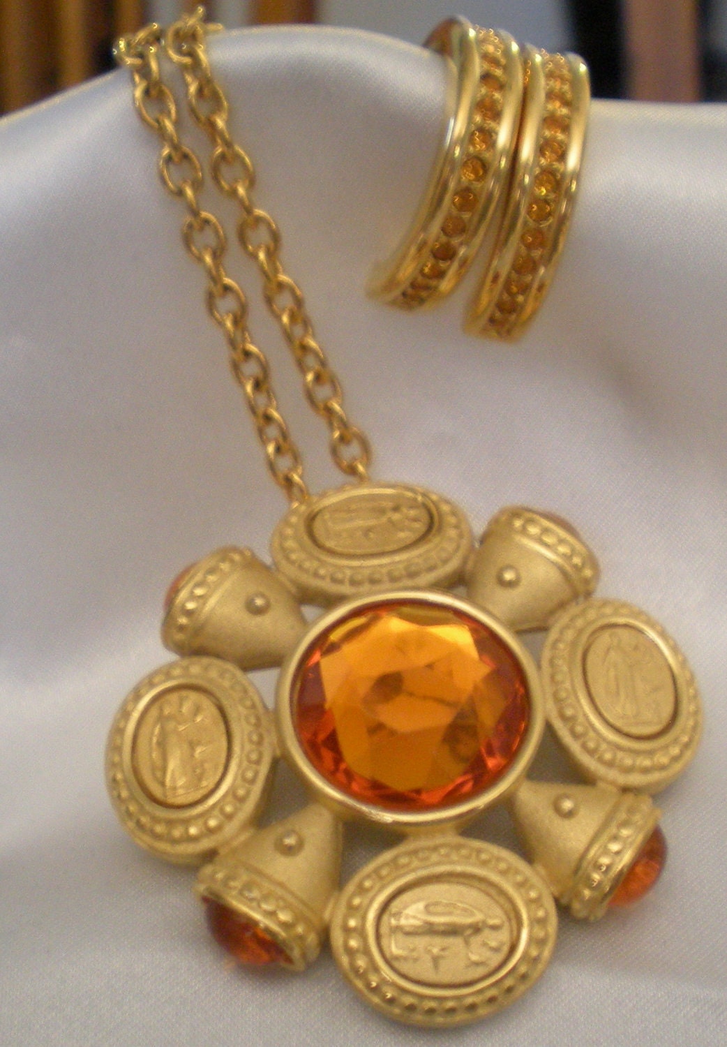 Napier gold aphrodite brooch/pendant with orange cabochons and rhinestone with matching pierced earrings