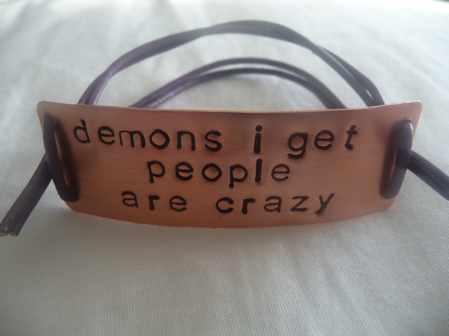 Supernatural Inspired Handstamped Bracelet 'demons i get people are crazy'